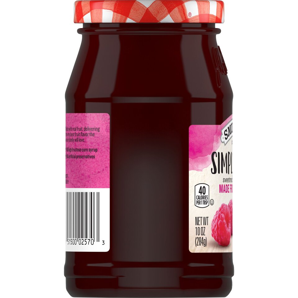 Simply Fruit® Seedless Red Raspberry Fruit Spread left with packaging