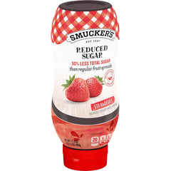 Smucker's® Reduced Sugar Strawberry Squeezable Fruit Spread front left with packaging